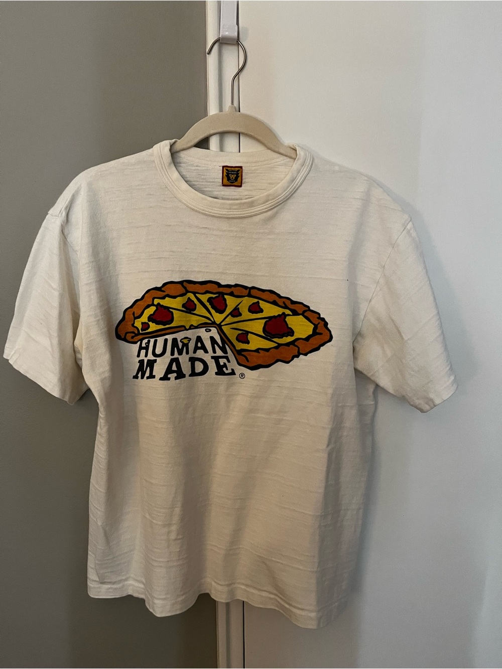 Human Made Cream Tee with Yellow & Red Logo Patch